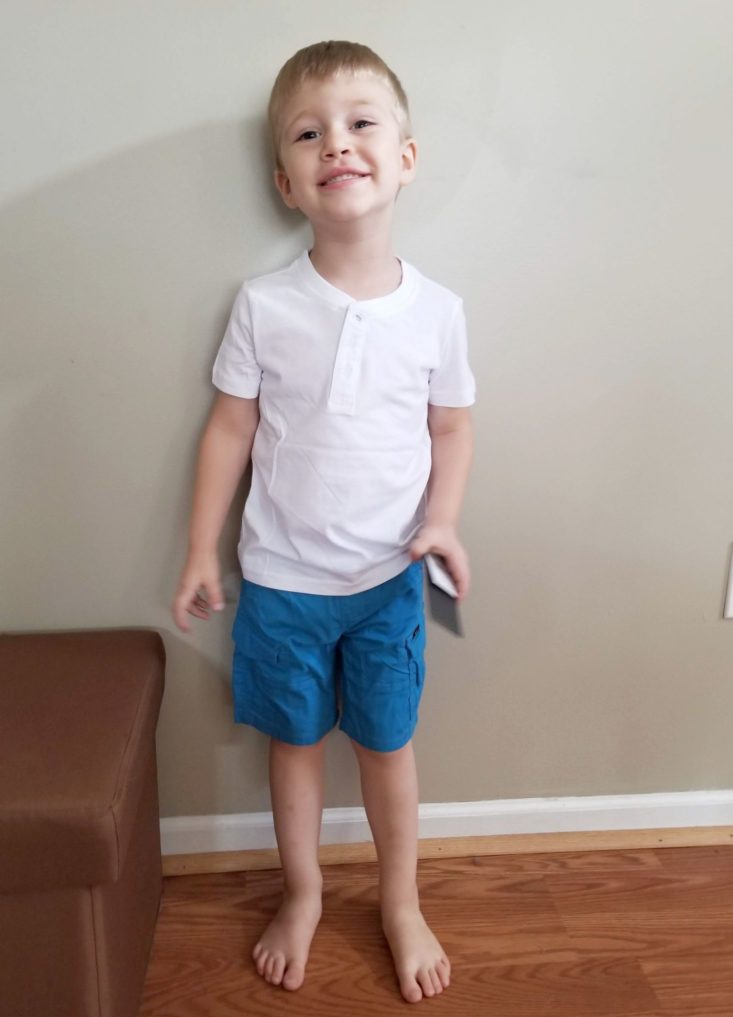 Kidbox July 2018 Gideon modeling white shirt and blue shorts