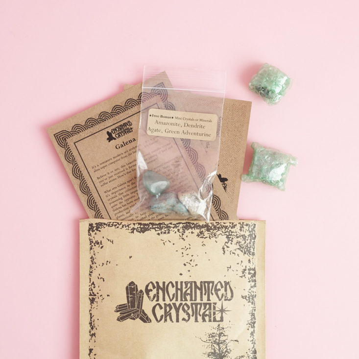 Enchanted Crystal mailer with items coming out