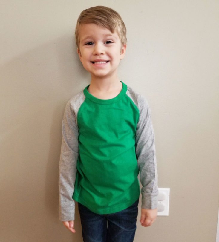Stitch Fix Boys December 2018 green raglan shirt modeled 1