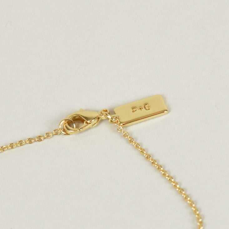 P+G tag on jewelry