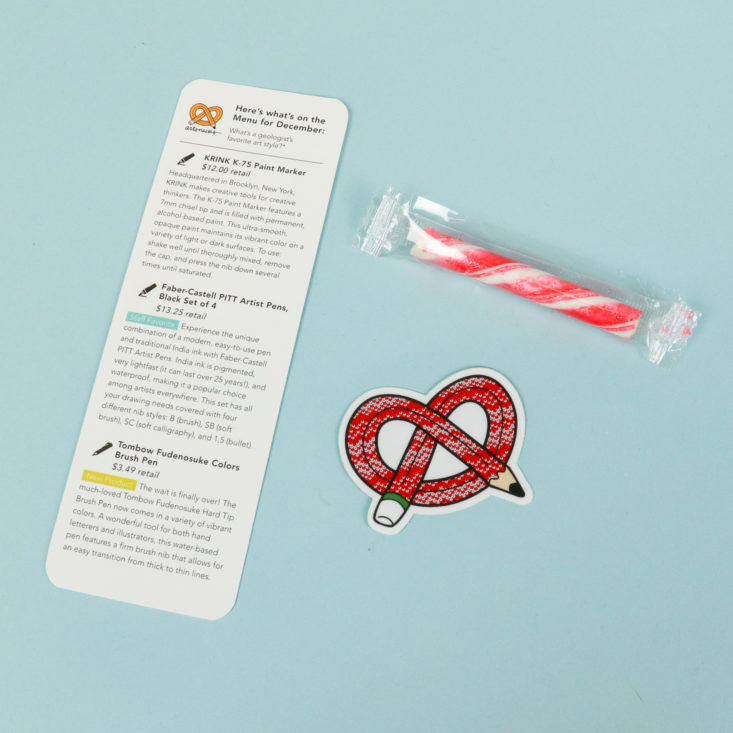 candy, sticker, and info card