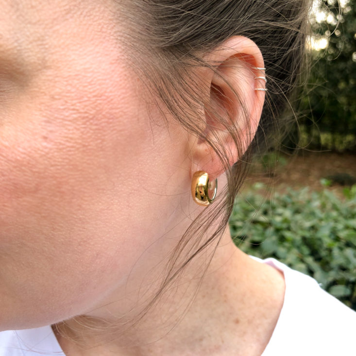 earrings worn gold side