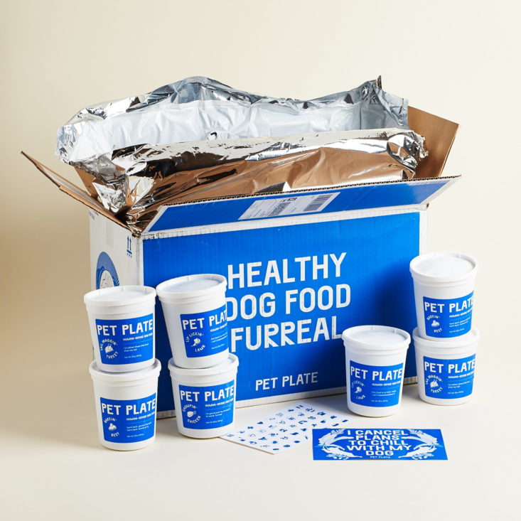 Pet Plate natural dog food blue box and food tubs