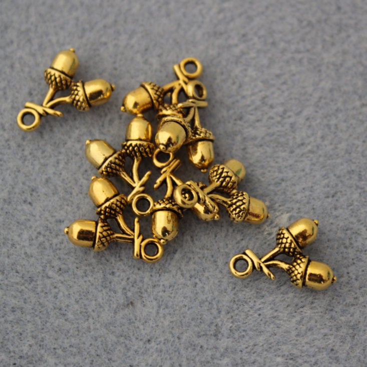 Blueberry Cove Beads March 2019 - Goldtone Acorn Charms Front