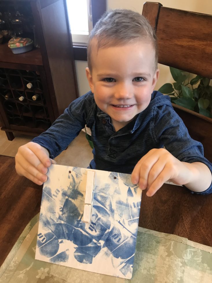 KidArtLit Deluxe Subscription Box Review March 2019 - Charlie Holding Top