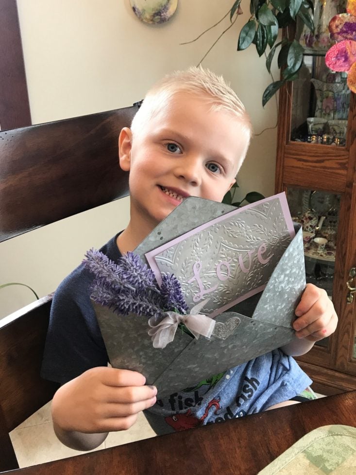 Confetti Grace April 2019 - ank holding envelope Front