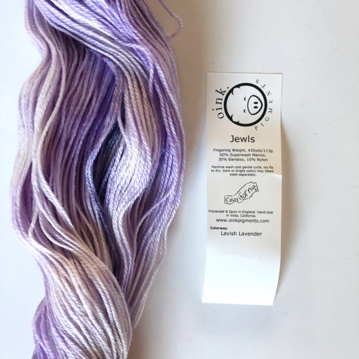 PostStitch Yarn Subscription Box Review June 2019 - Oink Pigments Jewls Yarn in color Lavish Lavender Label Top