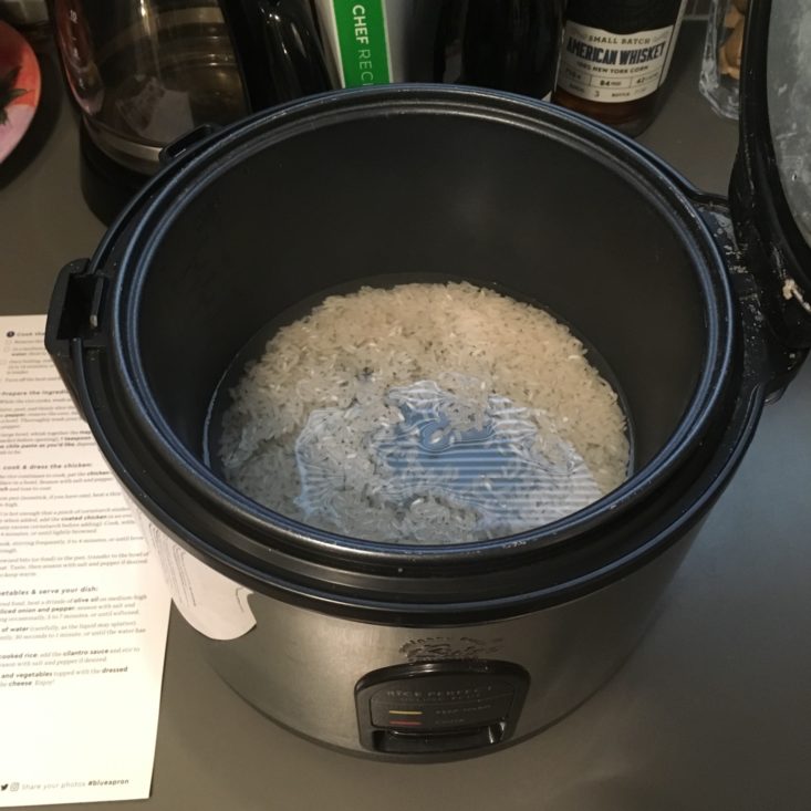 uncooked rice in rice cooker