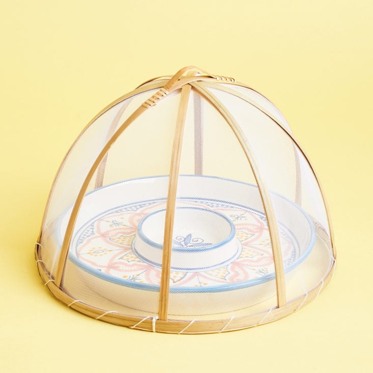 bamboo food tent over decorative dish