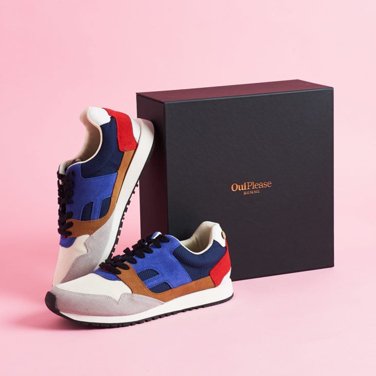Sneakers leaned up against Oui Please Homme Box