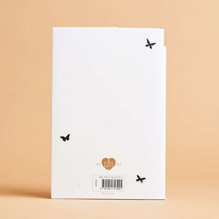 white back of book with three tiny black butterflies
