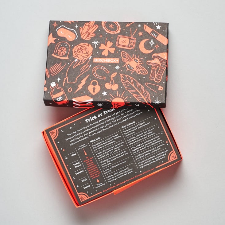 open orange and black halloween themed box