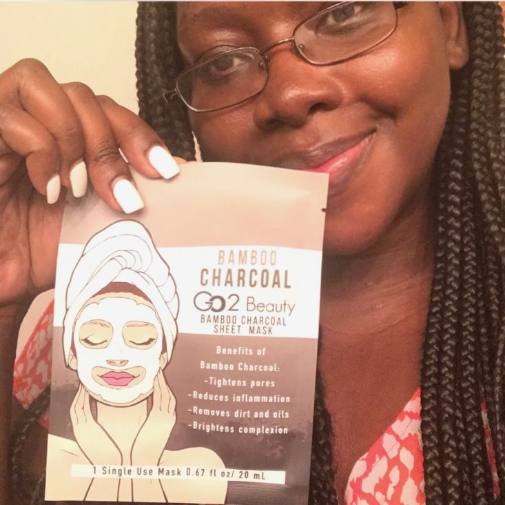 Boxycharm Makeup Tutorial October 2019 - Holding Up Sheet Mask Front