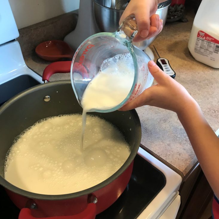 Young Chef's Club November 2019 pouring in milk